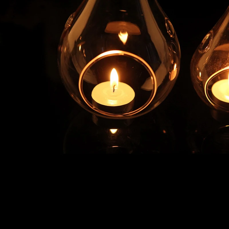 

Diameter=8cm 24pcs/pack Water Drop Shaped Glass Candle Holder with 2 small holes Hanging Glass Terrarium Wedding Decoration