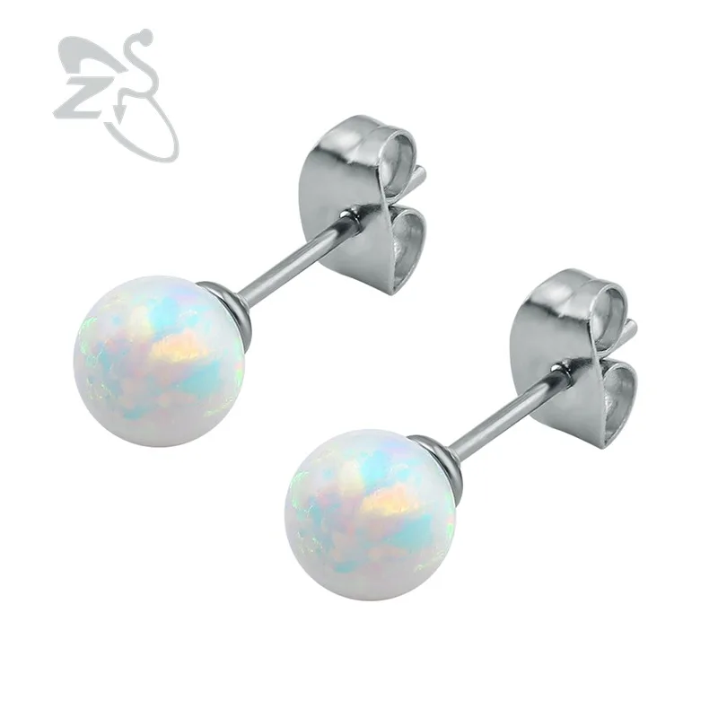 Женские серьги-гвоздики с белым огненным опалом серебряного цвета | Украшения и