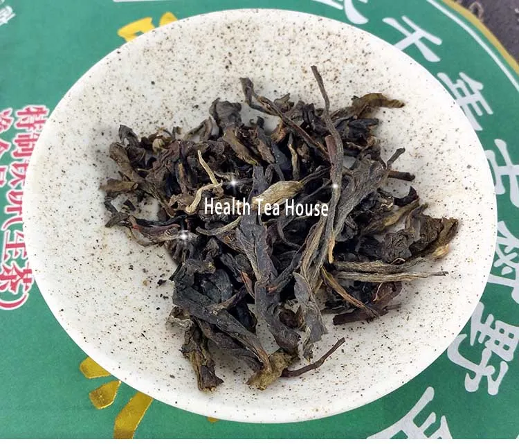 2012 Yr Yi Wu Millenary Old Tree Wild Shen Pu-erh 357 г, ветреное специальное железное сырье Pu-erh торт