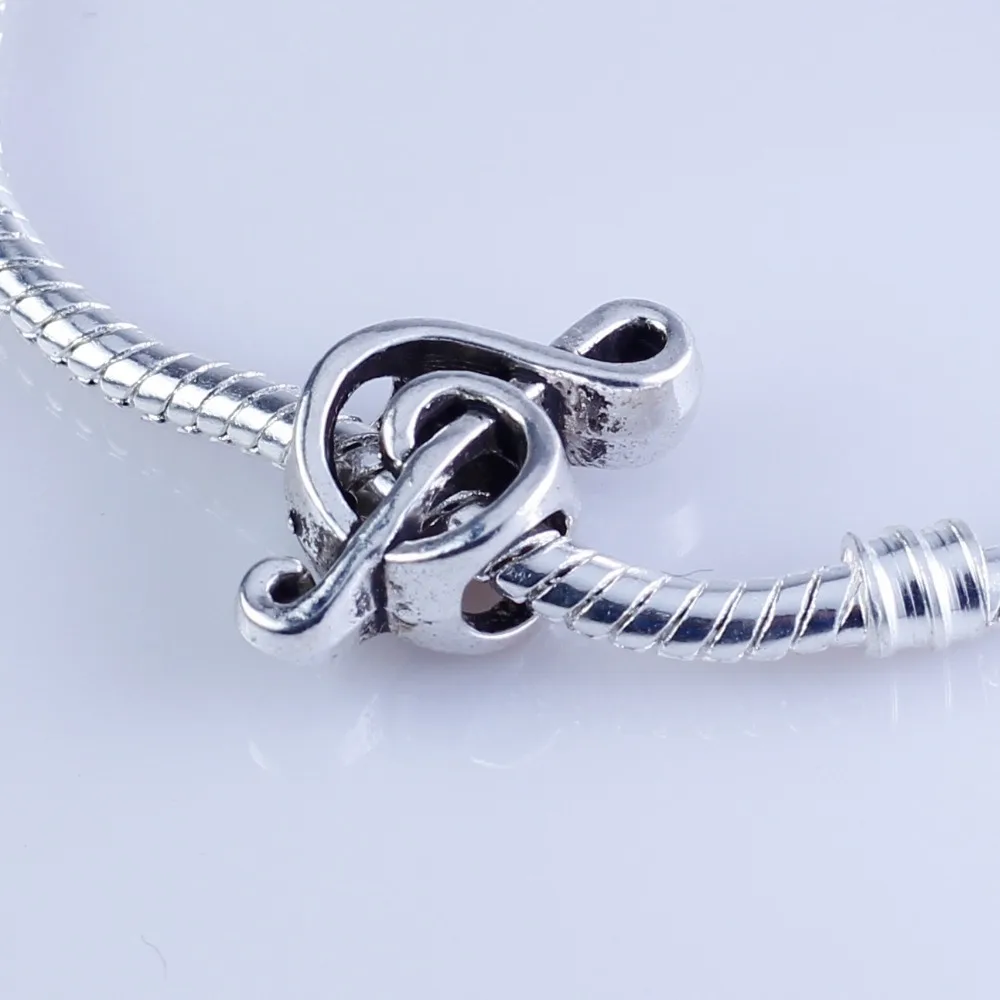 Оптовая продажа 40 шт. посеребренные бусины для музыкальных нот европейский