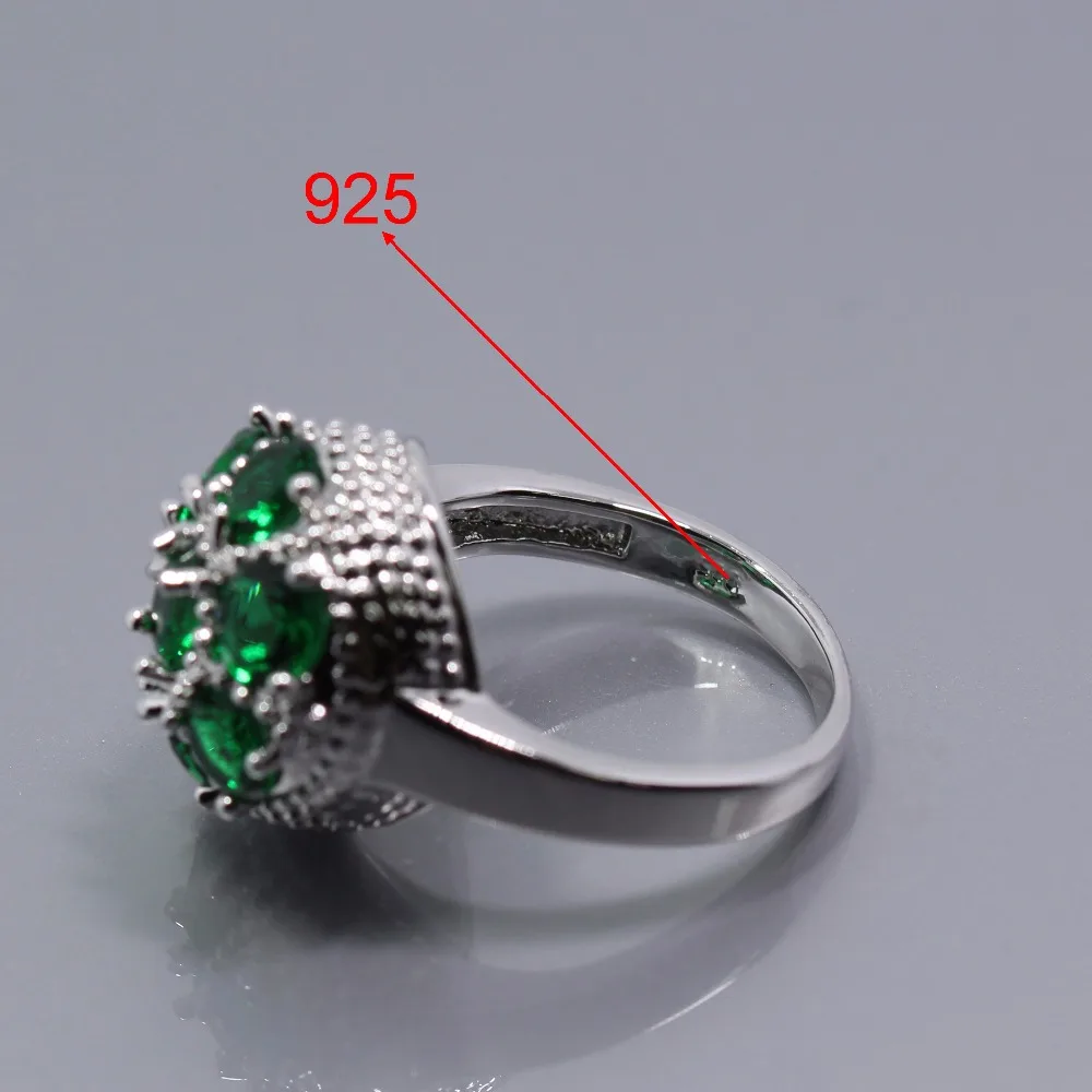 Кольцо-брелок от Manny с зеленым цирконом серебристого цвета размер кольца 6-7-8-9-10