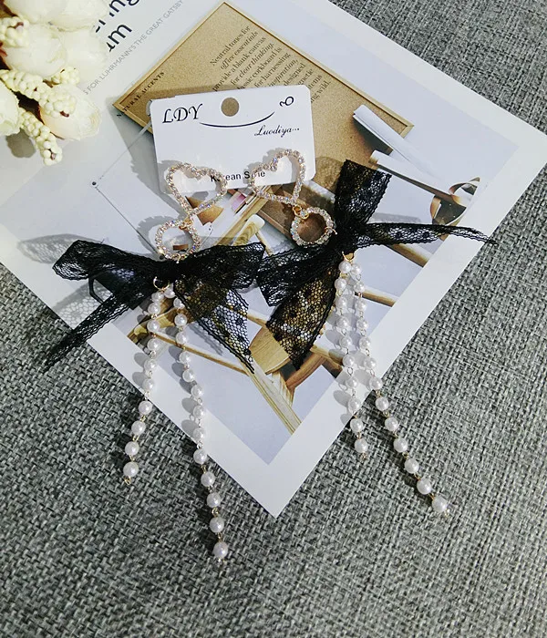 Женские серьги-подвески с большим кружевным бантом жемчугом и стразами модные