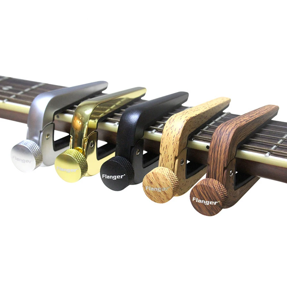 

Flanger FC-09 Guitar Capo Deluxe и более быстрое использование для акустической классической гитары. Качественная стальная пружина