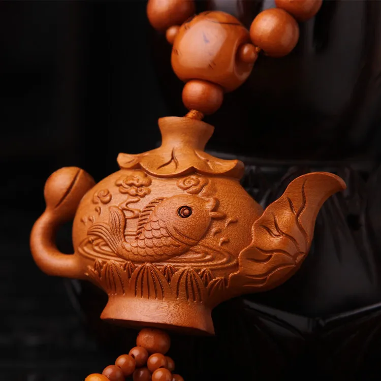 

Factory direct car pendant carp teapot high-grade peach wood key chain car hanging ornaments car supplies