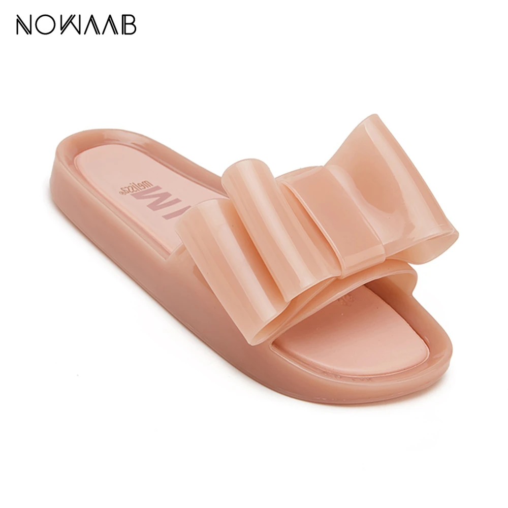 Женские сандалии-желе на плоской подошве с бантом | Обувь