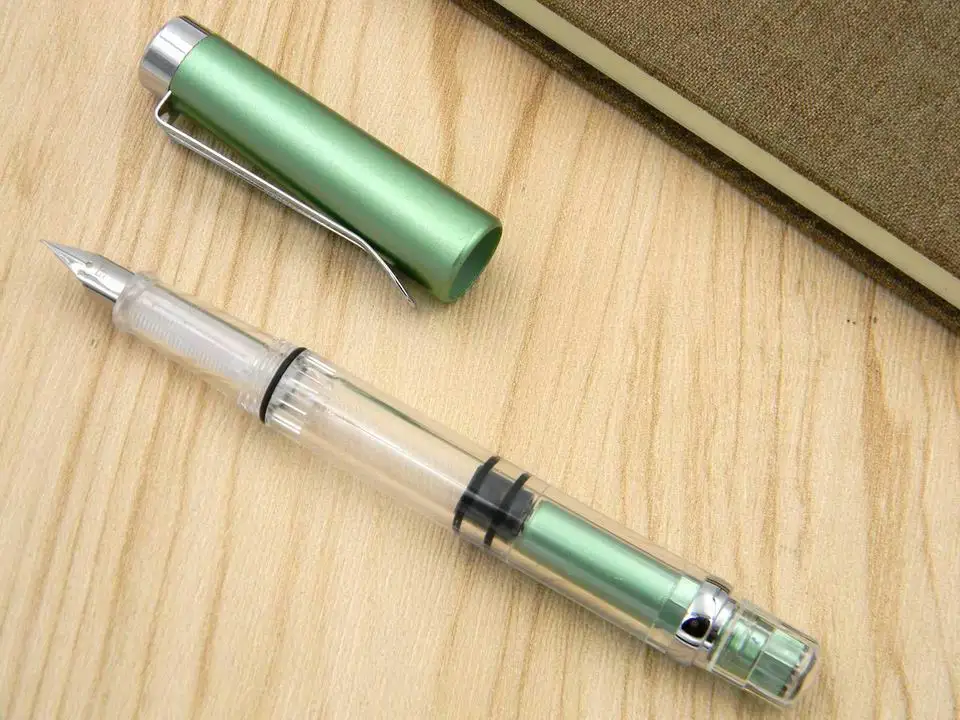 Transparent green Офис большой емкости магазина чернил вращающийся поршень пластик прозрачный серебряный отделка EF перо Подарочная авторучка - Цвет: Transparent green