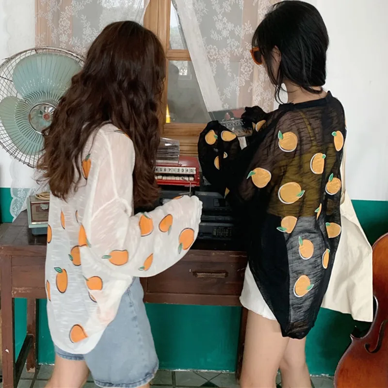 Футболка женская тонкая с принтом оранжевого цвета длинными рукавами круглой