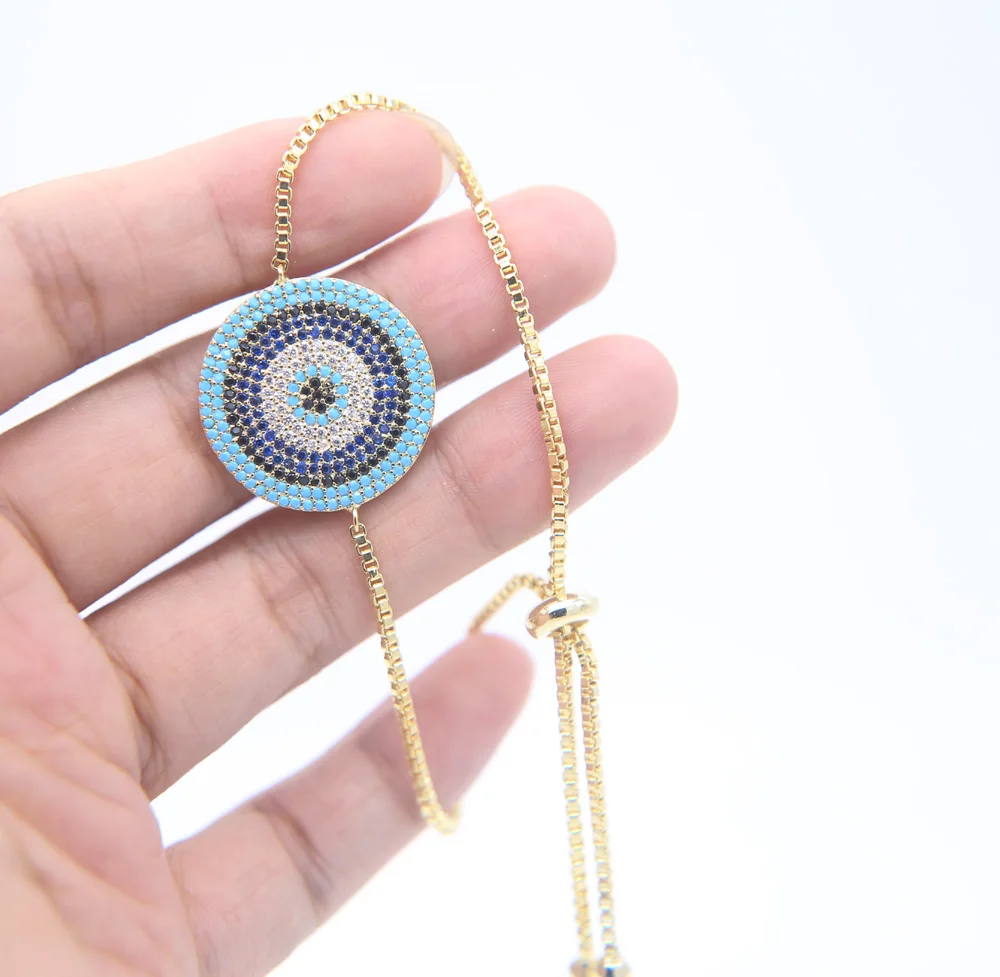 Женский минималистичный браслет с цепочкой Evil Eye золотистого цвета золотым