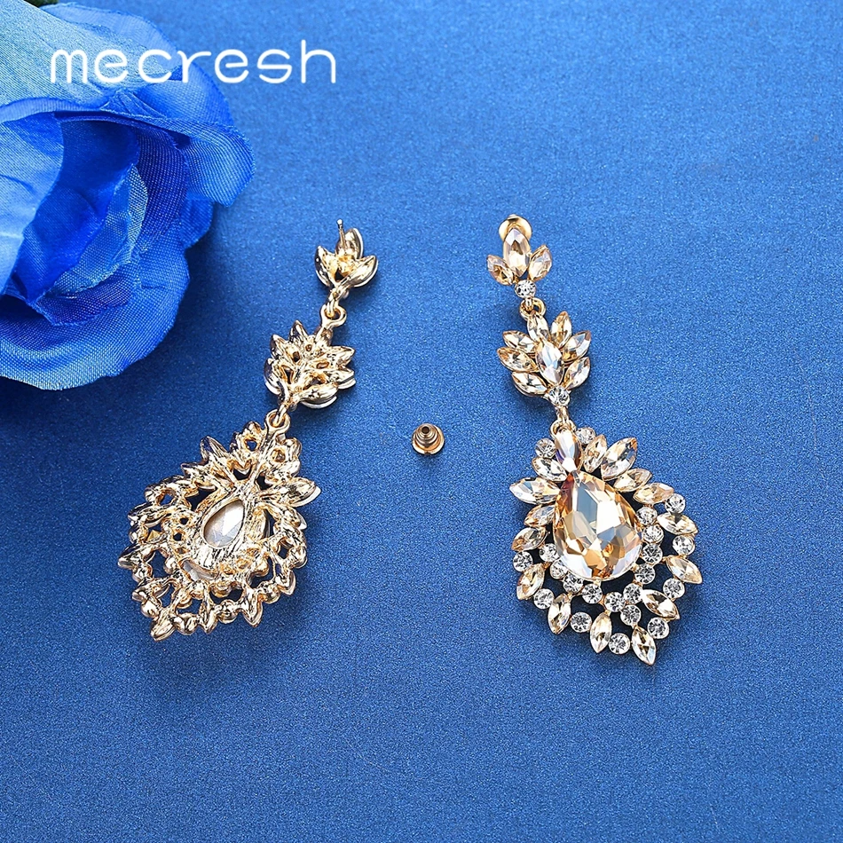 Женские серьги-подвески с кристаллами золотого цвета | Украшения и аксессуары