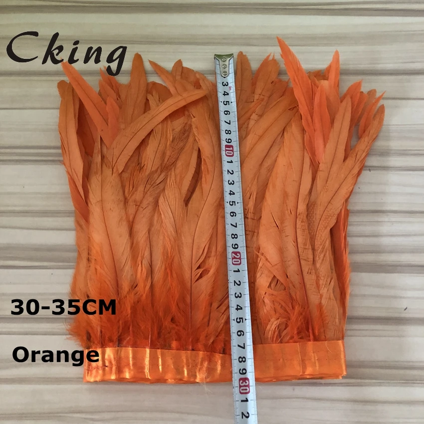

CKing Orange Bleached Dyed natural chicken feather trim 30 to 35 cm Long rooster tails Feather fringes boas for carnival custome