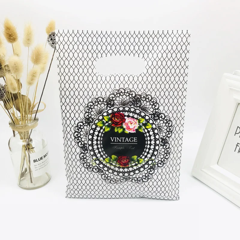 

50pcs 20X30CM Grid Flower Design Plastic Gift Bags Favor Jewelry Boutique Gift Packaging Plastic Shopping Bag With Handle