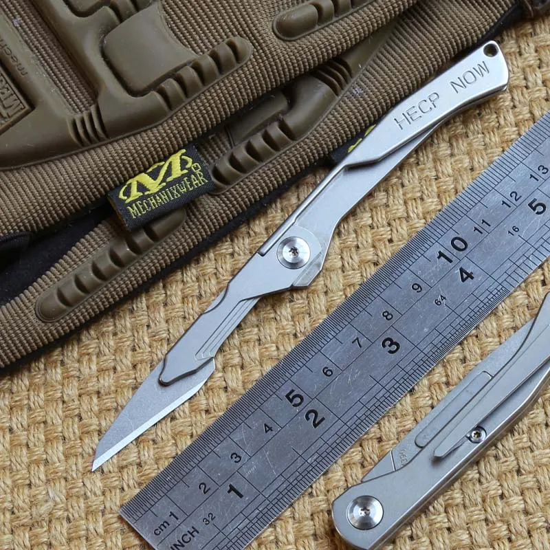 

Складной нож из титанового сплава, хирургическое лезвие EDC, портативный уличный спасательный нож с одним ручным открыванием и закрытием, ко...