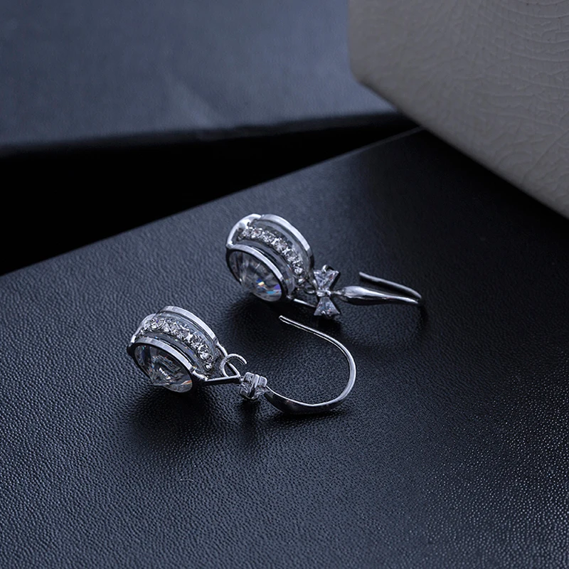 Корейские серьги подвески нового дизайна с большим кристаллом колесом и бантом