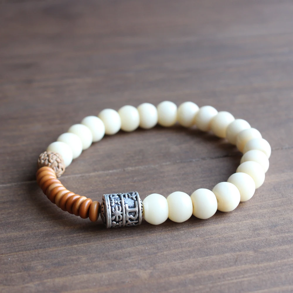 Оптовая продажа тибетского буддизма Тотем браслеты с подвесками & Tagua Гайка бусы