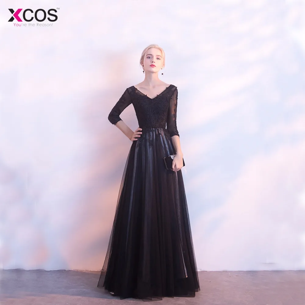 Элегантное платье с v-образным вырезом черного цвета аппликациями кружевное