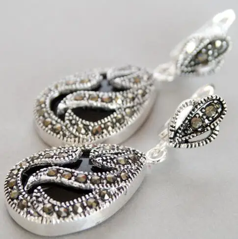 Серьги-капли из серебра 925 пробы с инкрустацией марказита и черным камнем |