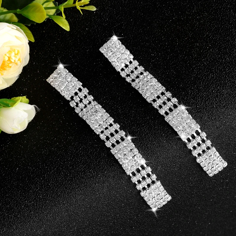 Серьги подвески с кристаллами женские длинные висячие украшения геометрической