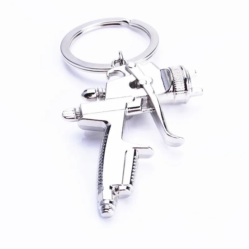 Water Spray Gun Keychain Metal Men Gift Car Key Chain Motorcycle Auto Accessories Creative Key Ring Water gun Key Cover Holder