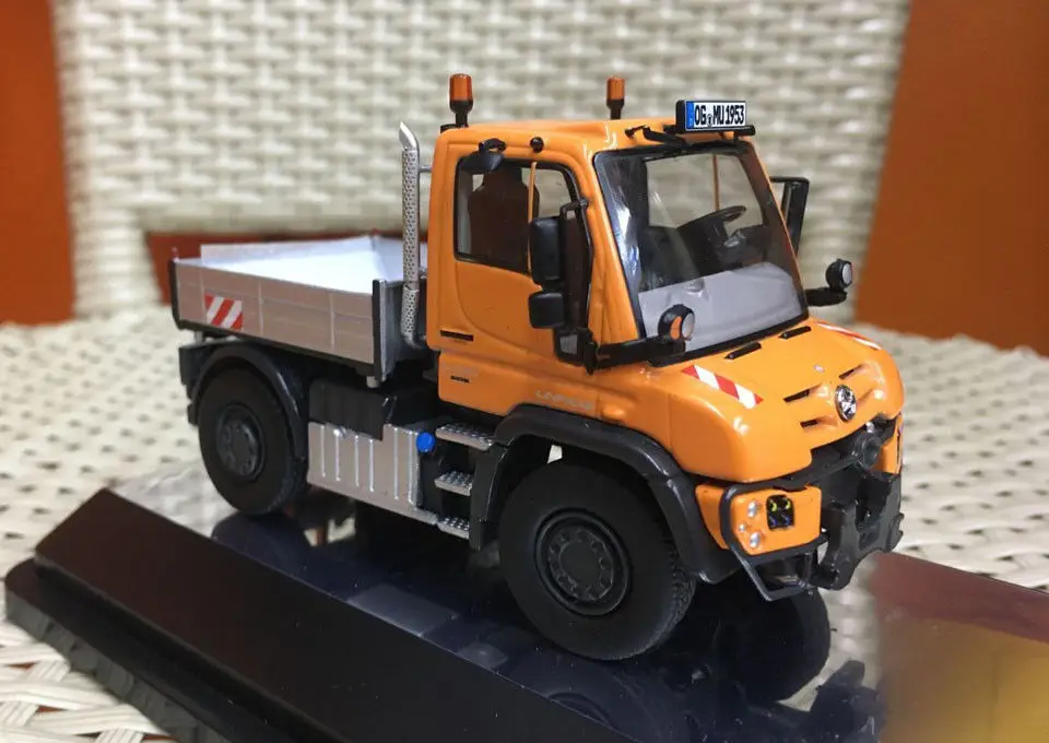 Mercedes-Benz Unimog U 430 с комбинированной косилкой оранжевый 1/50 от NZG 9101