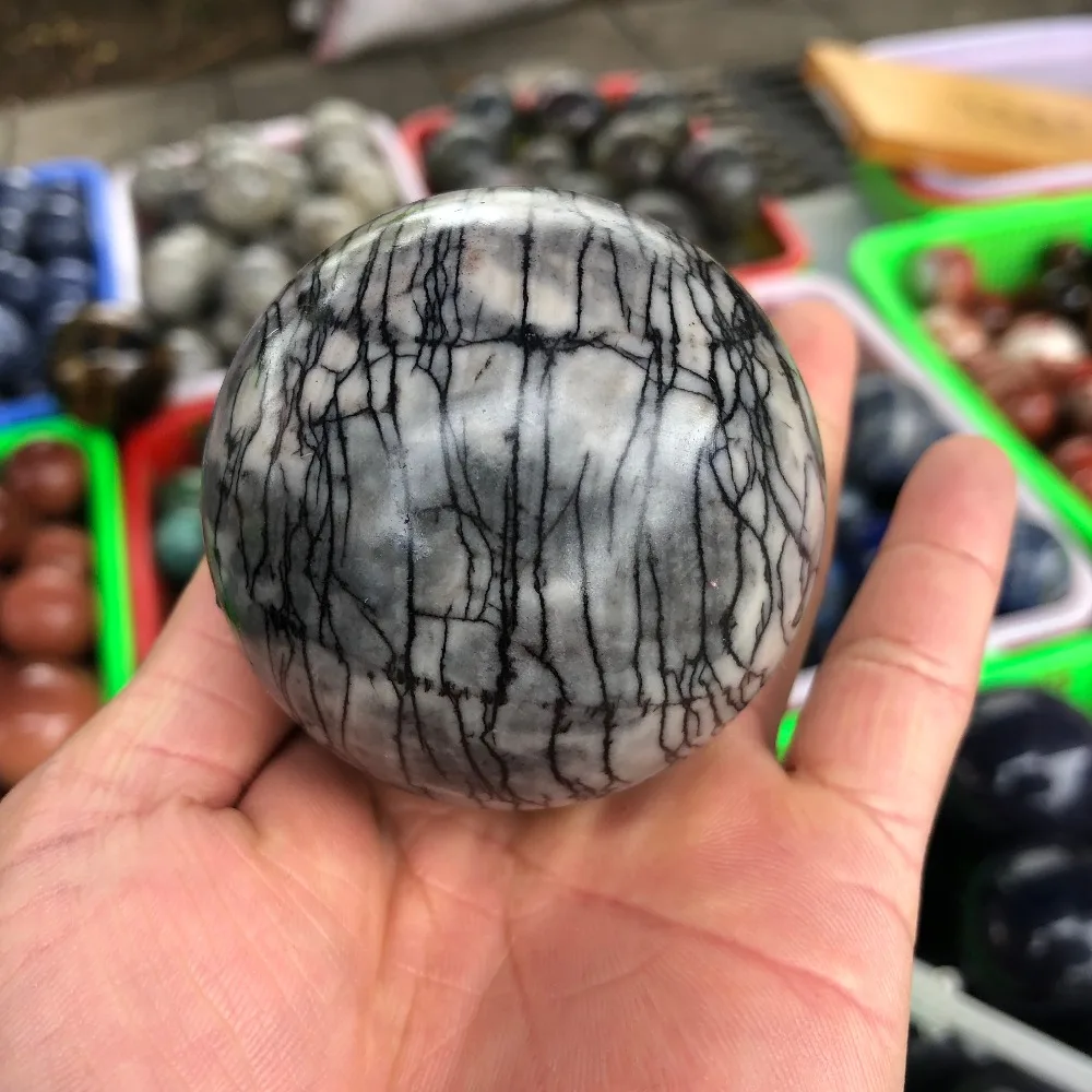 

Natural crystal fossils are handmade into crystal quartz spheres