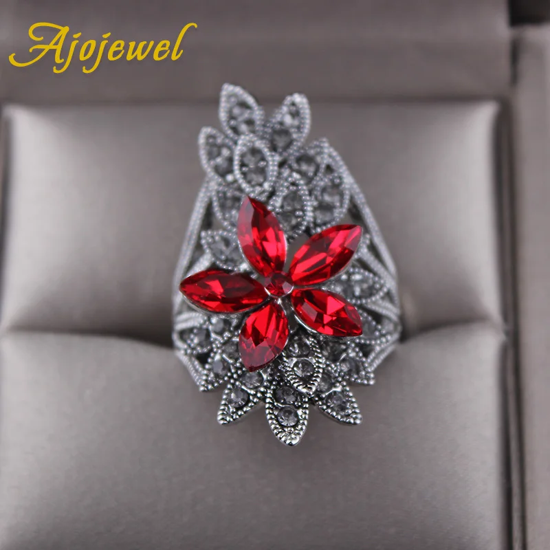 Женское кольцо с цветком Ajojewel черное красным кристаллом большие стразы