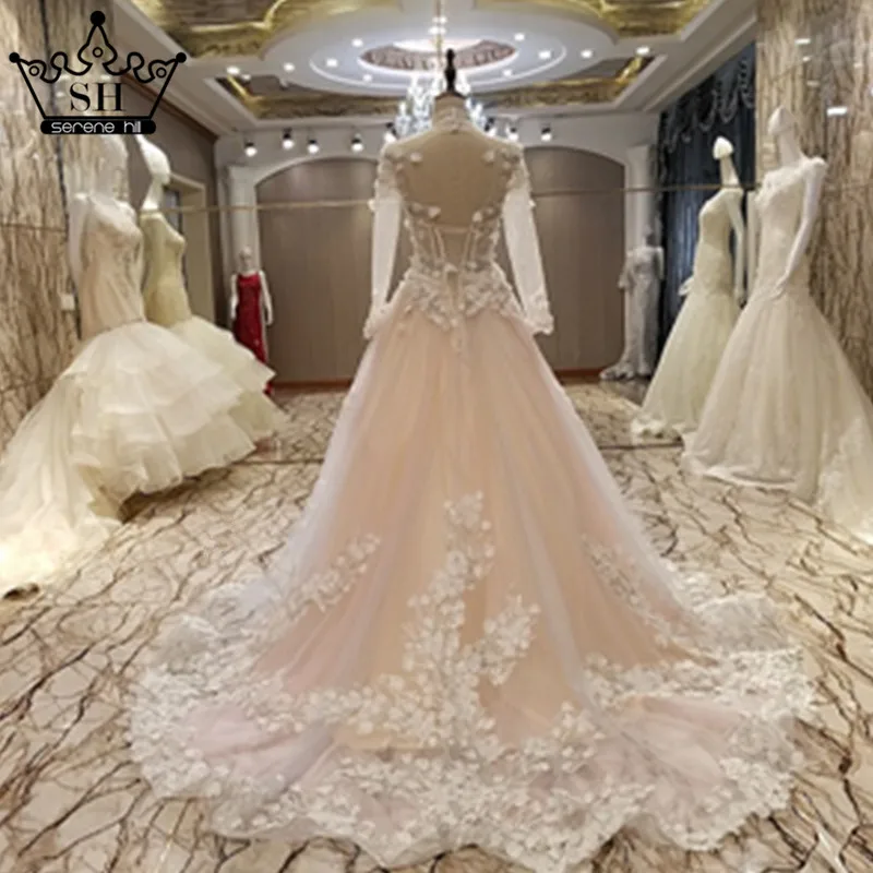 Роскошное сексуальное вечернее платье с длинными рукавами и открытой спиной