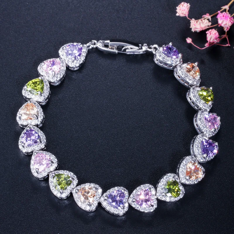 Женские вечерние браслеты и с голубым фианитом Pera в форме сердца белого золотого