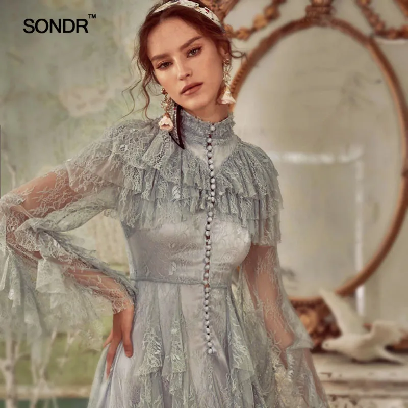 

SONDR 2019 Summer Embroidery Women Suit Butterfly Sleeve Pearl Button Perspective Top High Waist Irregular Female Two Piece Set