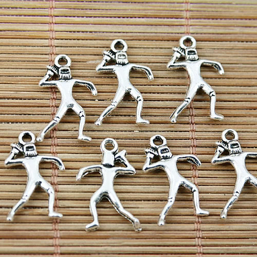

60pcs Tibetan silver tone rugby player design charms EF1525