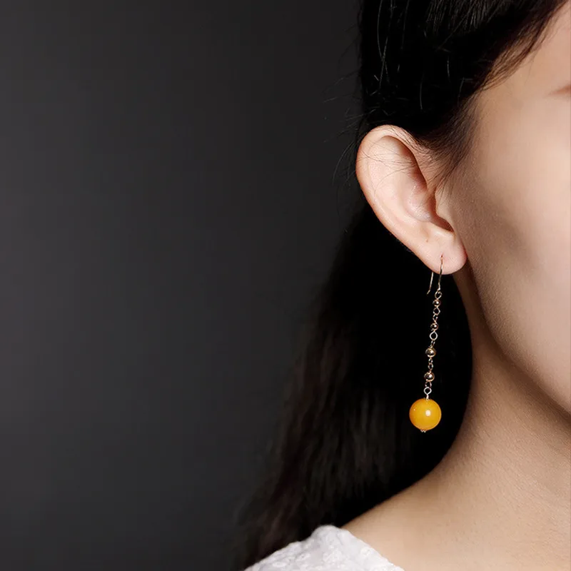 Женские серьги-подвески из серебра 100% пробы с натуральными янтарными шариками |