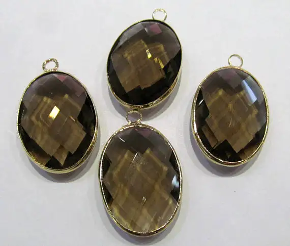 Овальный яйцообразный подвеска из стекла Топаз и Дымчатого кристалла, 12 штук, соединенных фасетированным двойным коннектором, в оригинальной версии из Смоки Рока с покрытием родием.