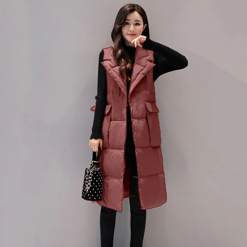 Женский хлопковый жилет средней длины на пуху осенне зимний теплый большого