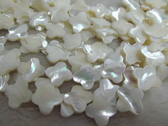 

high quality genuine MOP shell rondelle 12x12mm--3strands 16inch,high quality mother of pearl MOP clove black jet beads