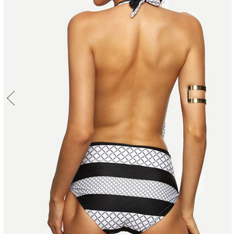 Женский купальник в полоску Tonichella черный или белый с глубоким v образным вырезом