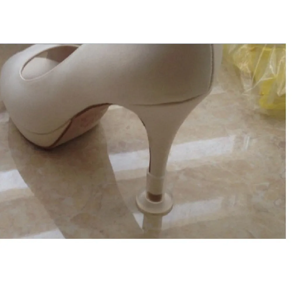 安い 100ペア/ロットスチレットヒールプロテクター結婚式草高heelers靴ヒールストッパーシリコーンプラスチックゲルヒールカバーcopri Tacco