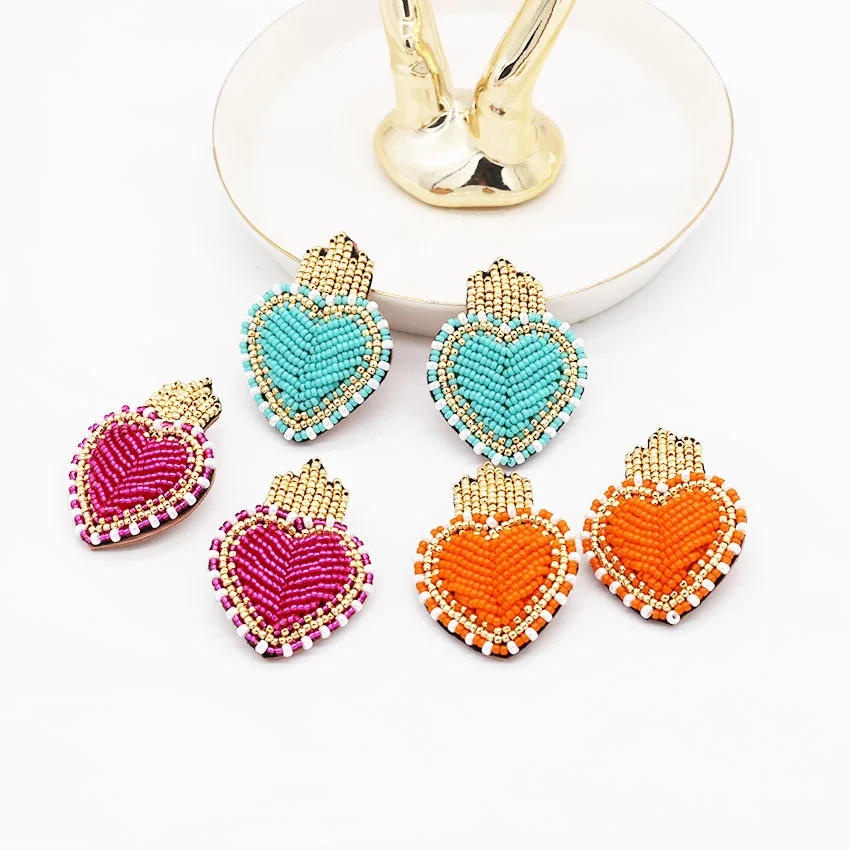 

Fashion temperament hand-stitched rice beads particles heart-shaped earrings street beat catwalk dance luxury earrings 963