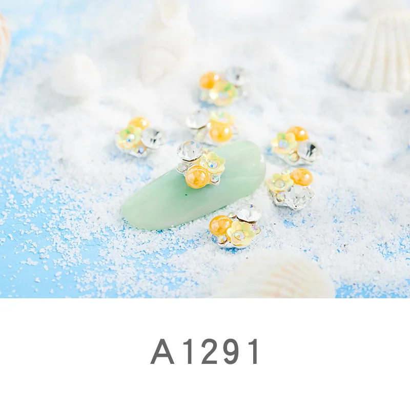 A1291(100pcs) 100 шт ногтей ювелирные изделия горный хрусталь жемчуг лук ногтей дрель ногтей сплав аксессуары - Цвет: A1291(100pcs)