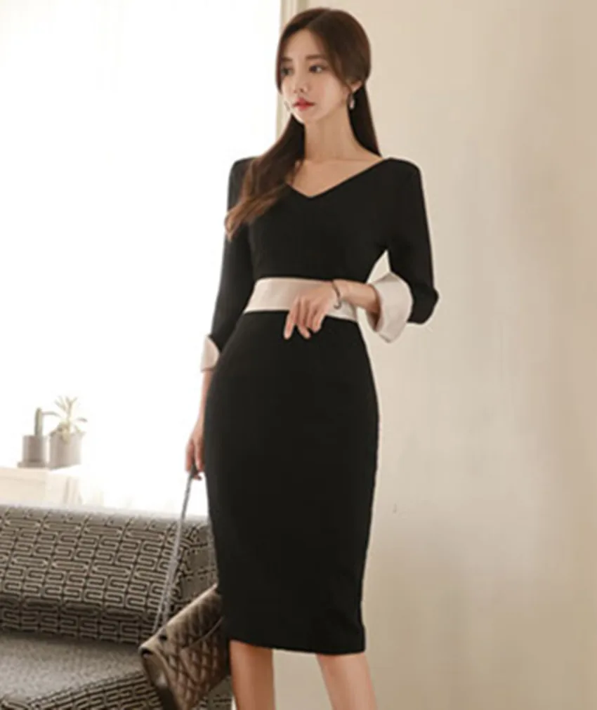 Женское облегающее платье футляр с длинным рукавом черное v образным вырезом