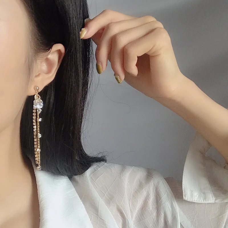 Женские длинные серьги с золотом