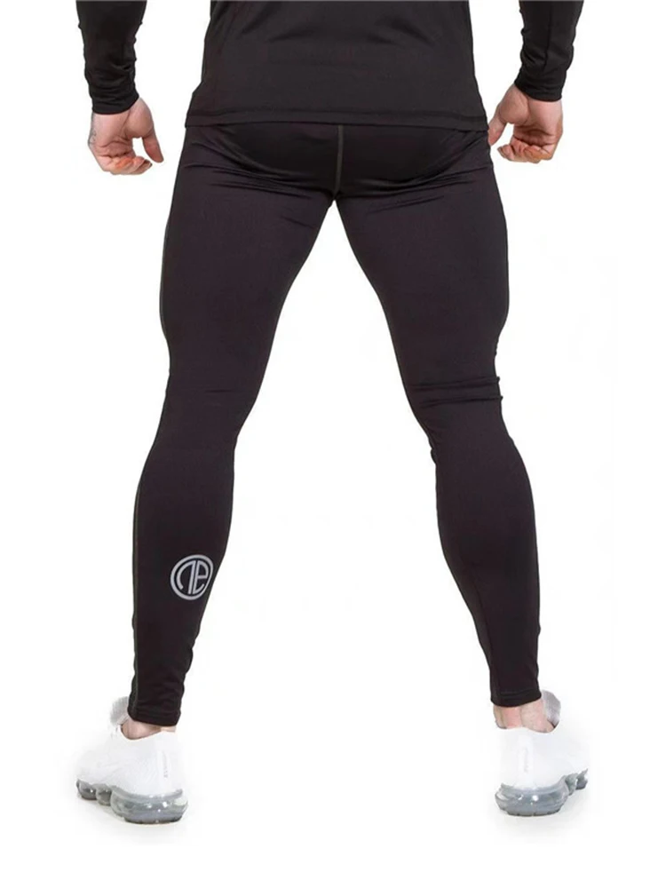 

GYMOHYEAH 2018 New High Elasticity Sweatpants Men Stripe Fitness Clothing Casual Gyms Bodybuilding Joggers Pant Skinny Trousers