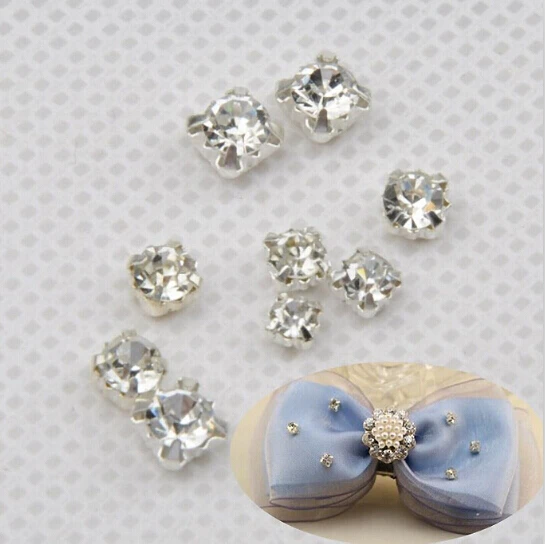 Стразы стеклянные в виде камней серебристые с прозрачными кристаллами пришивные