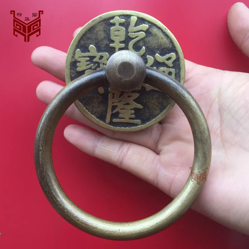 ручка монетка