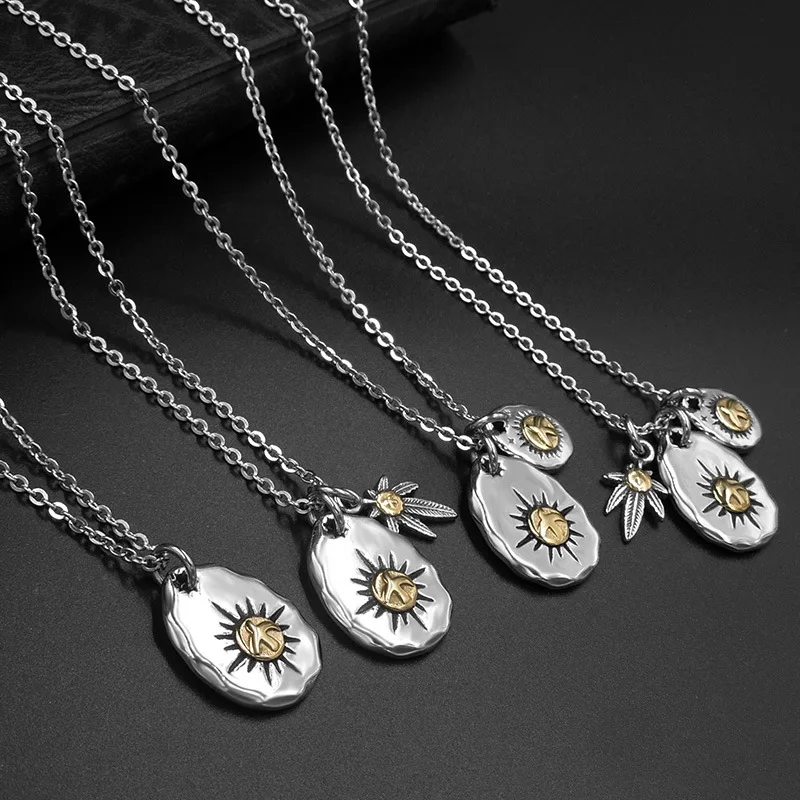 Ожерелье с подвеской в виде листьев конопли и кулонов из титановой стали