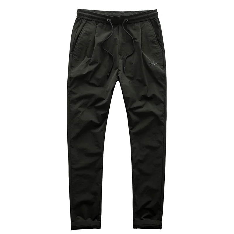 Повседневные брюки для мужчин тонкие весенне-летние без глажки узкие штаны из