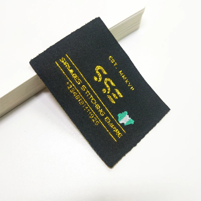 Производители поставляют этикетки для одежды тканые главные компьютерные