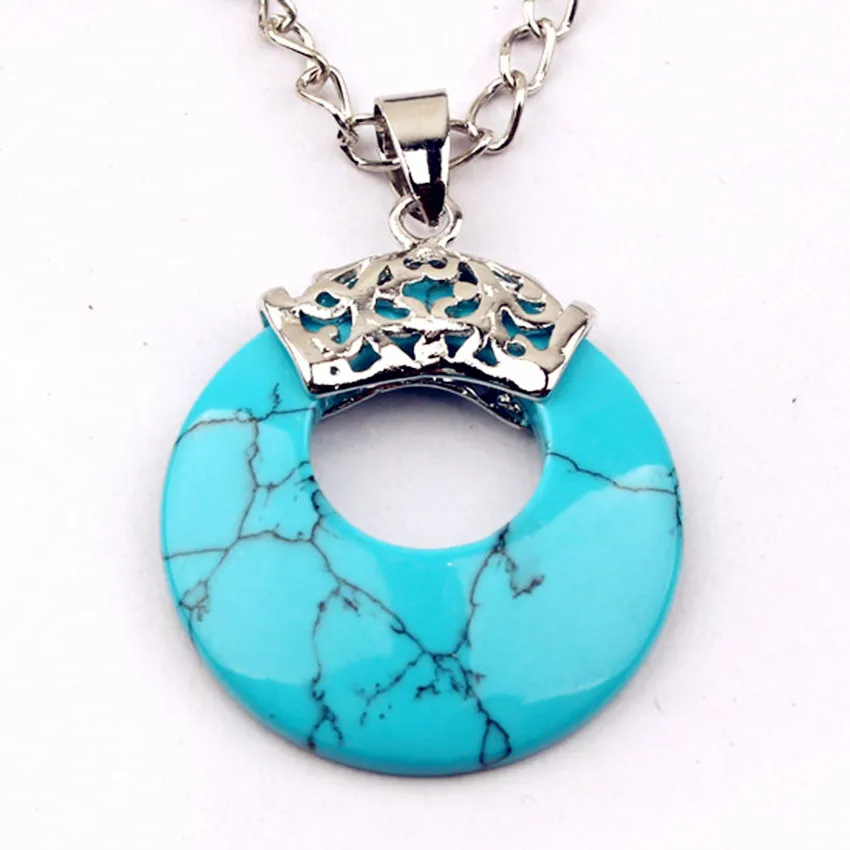 

FYJS Unique Jewelry Silver Plated Round Hollow Vintage Pendant Blue Turquoises Stone Necklace