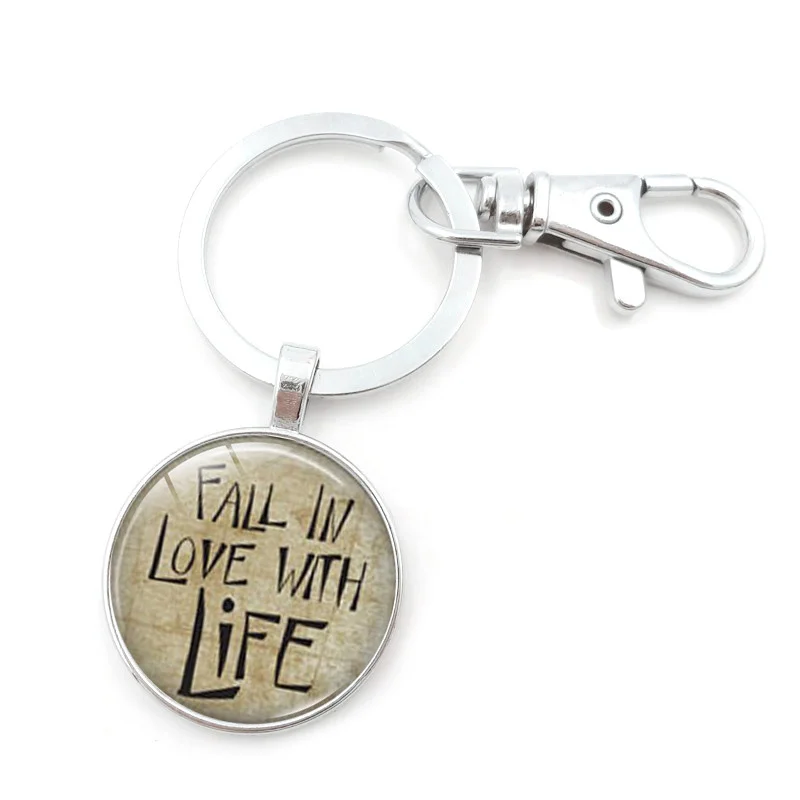 Моя история еще не закончена цитата брелок круглый стеклянный металлический