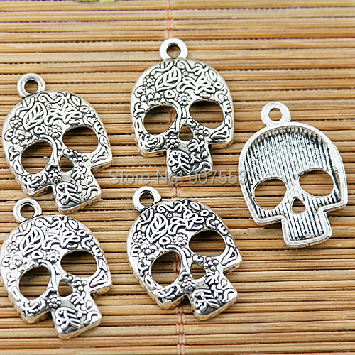 

20pcs tibetan silver color pattern skull faced design charms EF1442