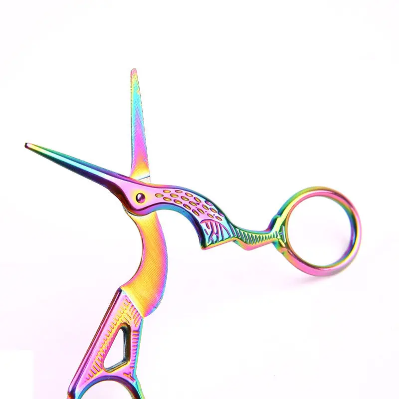 Ножницы для подравнивания бровей из нержавеющей стали в форме журавля.