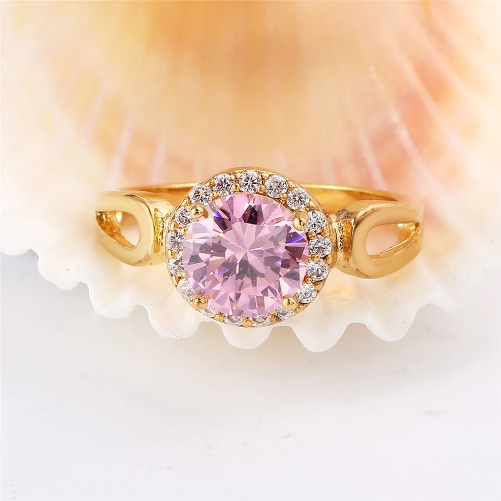 MOLIAM женское кольцо золотистого цвета розовое/красное круглое с фианитом и